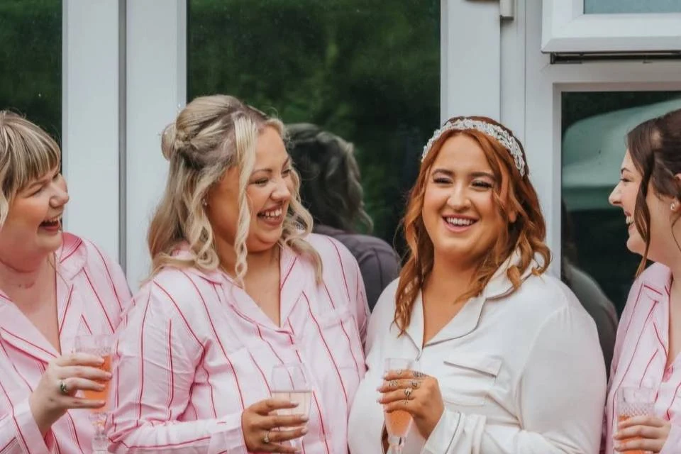 Bride celebrating with her bridal party