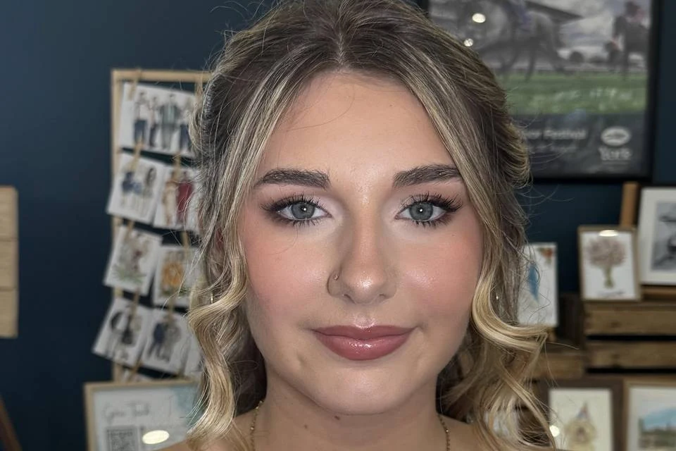 Finished bridal makeup with soft curls